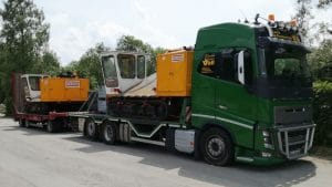 Volvo FH 660 mit doppeltem Baumaschinen Transport